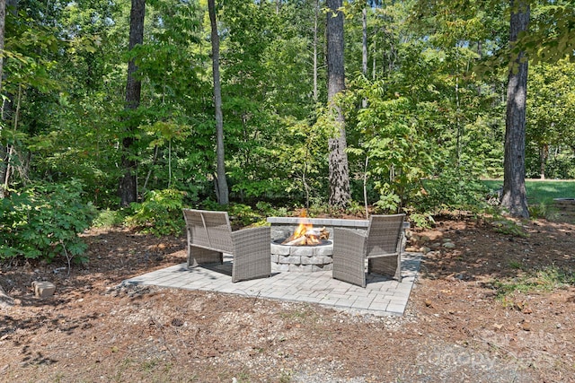 4195 Island Fox Ln, Denver, NC 28037 - view of patio / terrace with an outdoor fire pit