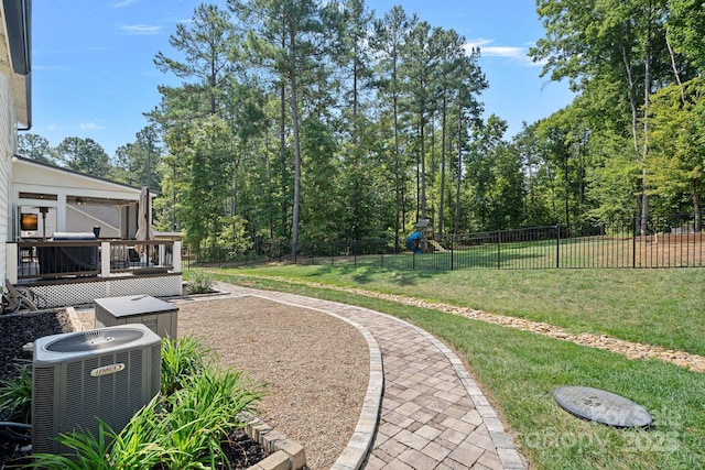 4195 Island Fox Ln, Denver, NC 28037 - view of yard with a fenced backyard, a wooden deck, and cooling unit