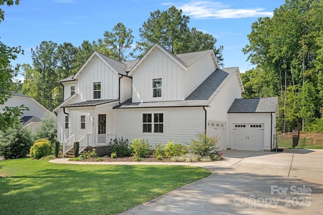 4195 Island Fox Ln, Denver, NC 28037 - modern inspired farmhouse featuring a shingled roof, concrete driveway, board and batten siding, a front yard, and a garage
