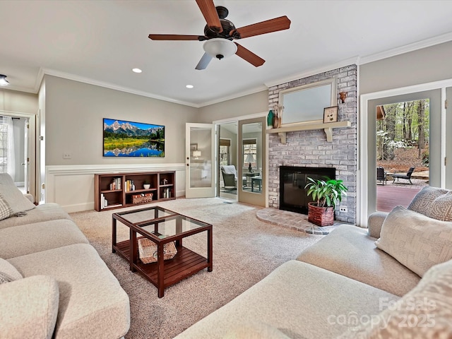 2313 Beechwood Dr, Waxhaw, NC 28173 - living room featuring crown molding, carpet, a fireplace, ceiling fan, and recessed lighting
