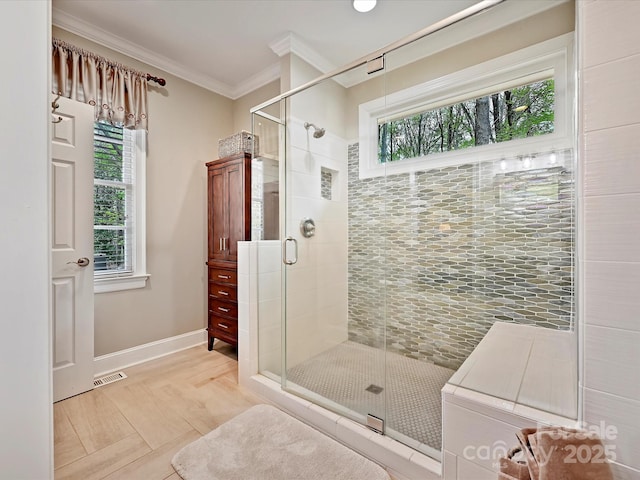 2313 Beechwood Dr, Waxhaw, NC 28173 - full bathroom with plenty of natural light, crown molding, a shower stall, and baseboards