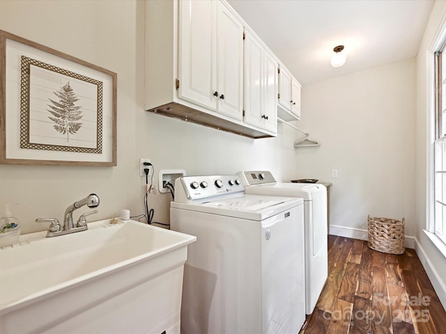 2313 Beechwood Dr, Waxhaw, NC 28173 - laundry room featuring washing machine and dryer, dark wood-type flooring, cabinet space, and baseboards