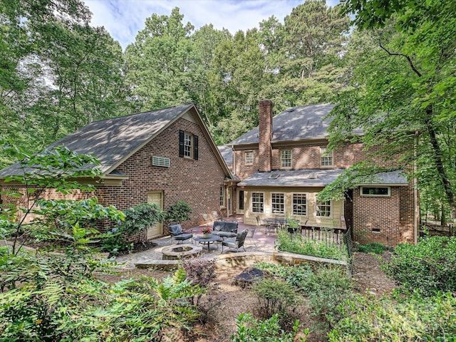 2313 Beechwood Dr, Waxhaw, NC 28173 - rear view of property with a patio, outdoor lounge area, brick siding, and a chimney