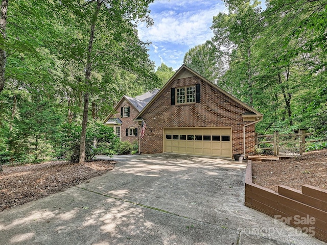 2313 Beechwood Dr, Waxhaw, NC 28173 - traditional-style house with concrete driveway, brick siding, and a garage