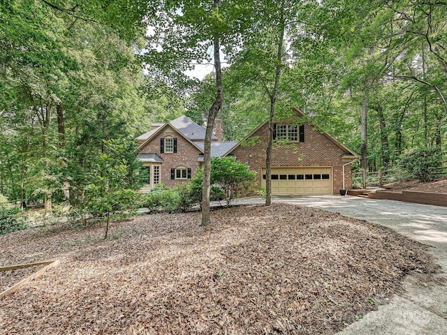 2313 Beechwood Dr, Waxhaw, NC 28173 - traditional-style house with brick siding, driveway, and an attached garage