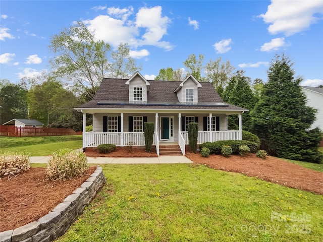 4222 Mt Gallant Rd, Rock Hill, SC 29732 - cape cod-style house featuring a front yard, a porch, a shingled roof, and fence