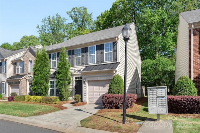 view of front of home with a garage and driveway