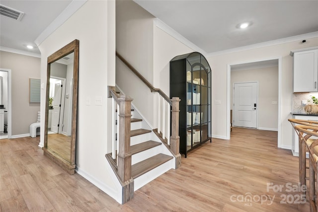 13709 Roderick Dr Unit 193, Huntersville, NC 28078 - stairs with ornamental molding, visible vents, recessed lighting, wood finished floors, and baseboards