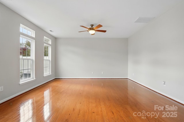 125 Snead Rd Unit 60, Fort Mill, SC 29715 - unfurnished room with baseboards, visible vents, wood finished floors, and a ceiling fan