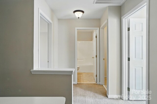 125 Snead Rd Unit 60, Fort Mill, SC 29715 - hallway featuring light carpet, baseboards, and visible vents