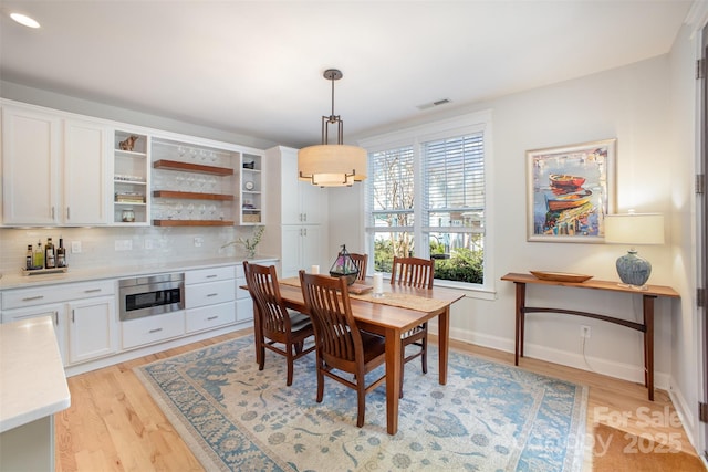 107 Iris Meadow Dr, Mooresville, NC 28115 - dining room with baseboards, recessed lighting, visible vents, and light wood-style floors