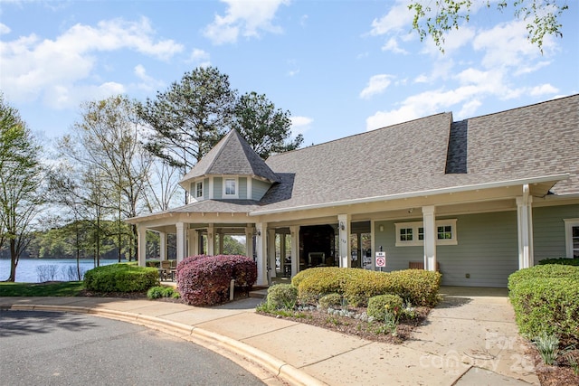 107 Iris Meadow Dr, Mooresville, NC 28115 - victorian home with a water view and roof with shingles