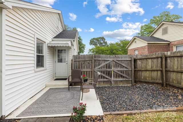 view of patio featuring fence