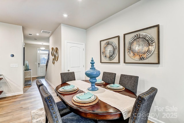 8038 Downy Oak Ln, Charlotte, NC 28269 - dining space with light wood-type flooring, recessed lighting, baseboards, and visible vents