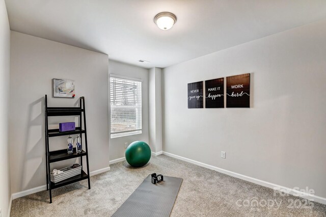 8038 Downy Oak Ln, Charlotte, NC 28269 - exercise area with carpet floors and baseboards