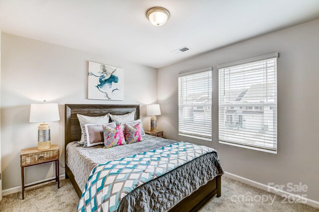 8038 Downy Oak Ln, Charlotte, NC 28269 - bedroom featuring carpet flooring, baseboards, and visible vents