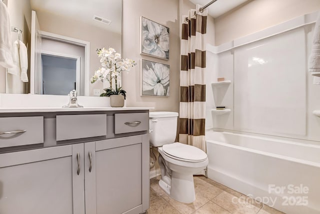 8038 Downy Oak Ln, Charlotte, NC 28269 - bathroom with tile patterned floors, toilet, vanity, shower / bath combo, and visible vents