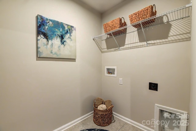 8038 Downy Oak Ln, Charlotte, NC 28269 - clothes washing area featuring washer hookup, hookup for an electric dryer, laundry area, tile patterned flooring, and baseboards