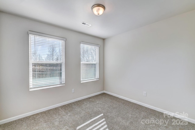 8042 Downy Oak Ln, Charlotte, NC 28269 - carpeted empty room featuring baseboards and visible vents