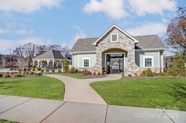 8042 Downy Oak Ln, Charlotte, NC 28269 - view of front of house featuring stone siding, a gazebo, and a front yard