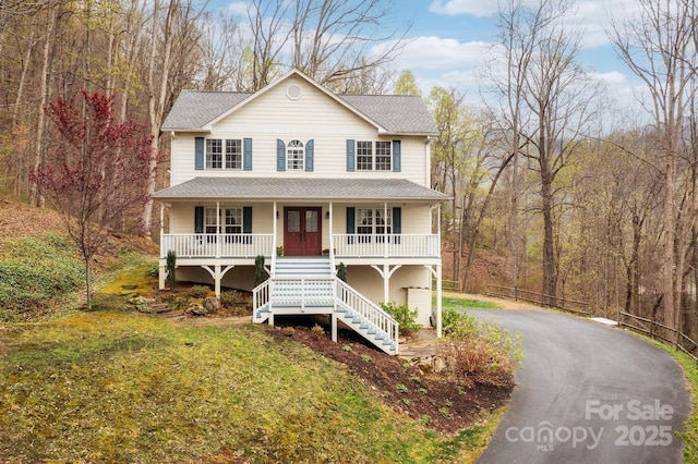 51 Sugar Hill Dr, Weaverville, NC 28787 - view of front facade with stairway, aphalt driveway, a front lawn, covered porch, and roof with shingles