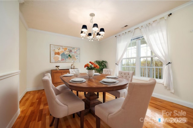 51 Sugar Hill Dr, Weaverville, NC 28787 - dining room with visible vents, baseboards, an inviting chandelier, and crown molding