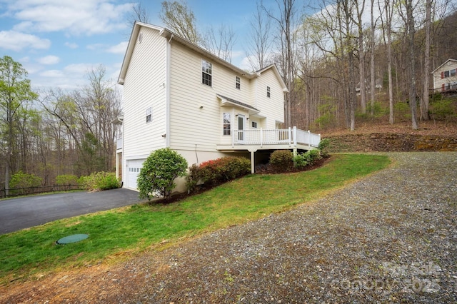 51 Sugar Hill Dr, Weaverville, NC 28787 - view of home's exterior with a lawn, driveway, a deck, and a garage