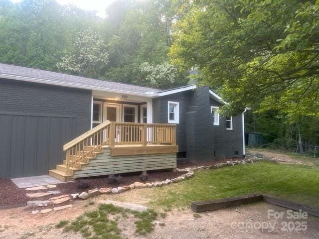 507 N Fork Rd, Black Mountain, NC 28711 - rear view of property with a lawn and brick siding