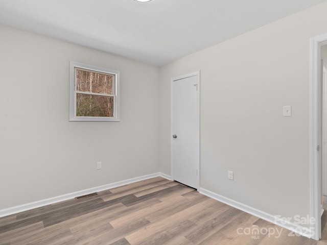 507 N Fork Rd, Black Mountain, NC 28711 - spare room featuring wood finished floors and baseboards