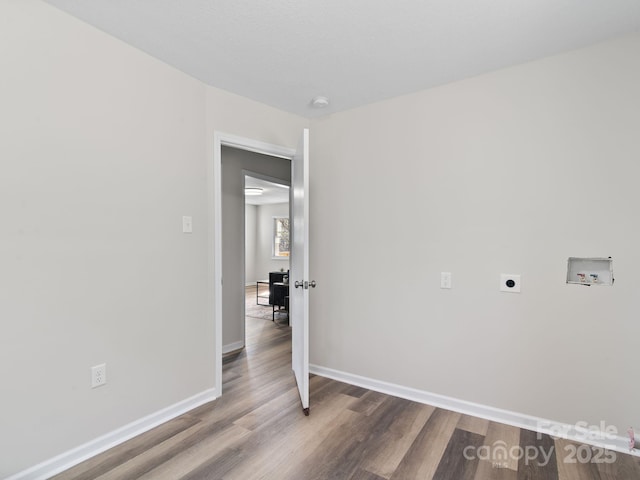 507 N Fork Rd, Black Mountain, NC 28711 - washroom with hookup for a washing machine, wood finished floors, baseboards, electric dryer hookup, and an office area