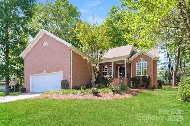 view of front of property with a garage, a front yard, and gravel driveway