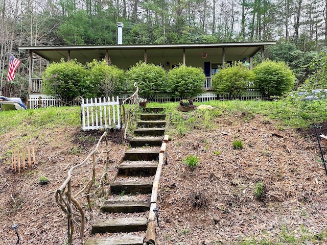 view of front of house featuring stairs