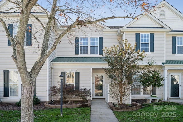 4211 Center Place Dr, Harrisburg, NC 28075 - townhome / multi-family property with metal roof