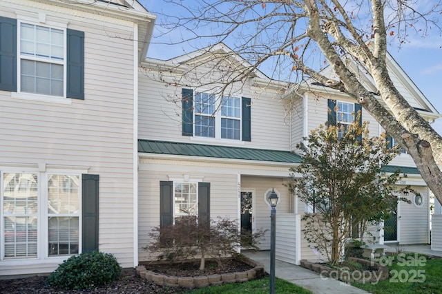 4211 Center Place Dr, Harrisburg, NC 28075 - view of property with metal roof