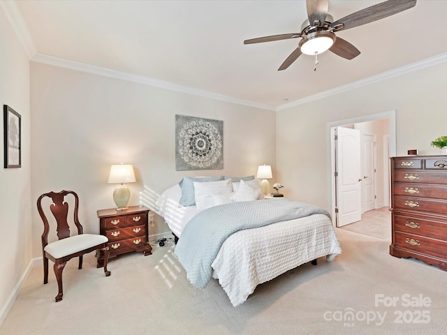 bedroom featuring ceiling fan, baseboards, light colored carpet, and crown molding