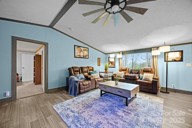 living area featuring light wood-style flooring, ceiling fan, lofted ceiling, and a textured ceiling