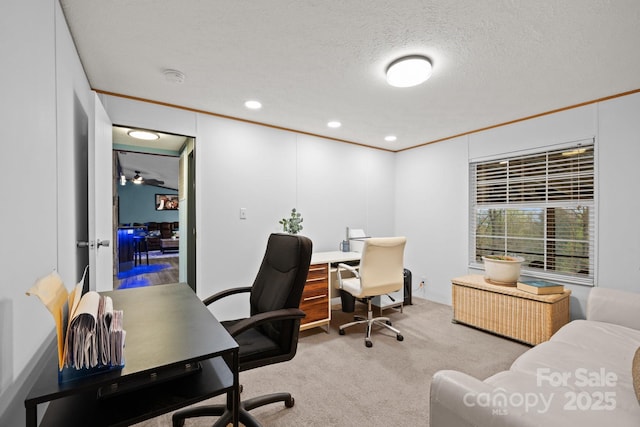home office featuring crown molding, recessed lighting, carpet, and a textured ceiling