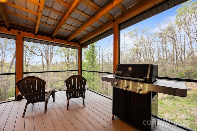 wooden terrace with area for grilling