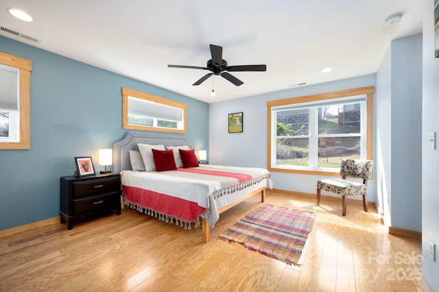 bedroom with visible vents, baseboards, recessed lighting, wood finished floors, and ceiling fan