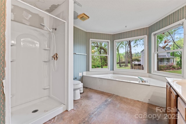 bathroom with vanity, wallpapered walls, a textured ceiling, toilet, and a shower stall