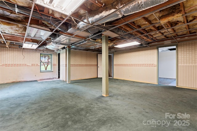 below grade area with carpet flooring