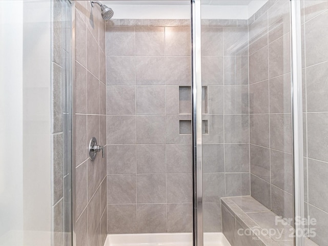 bathroom with a stall shower