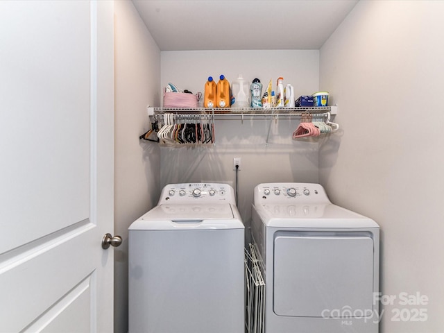 laundry area featuring washing machine and dryer