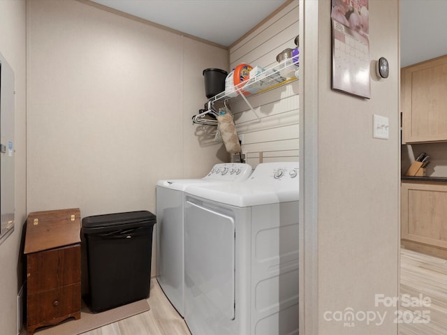 2234 Emerald Mine Rd, Shelby, NC 28152 - laundry room featuring light wood-style flooring, washing machine and clothes dryer, and laundry area