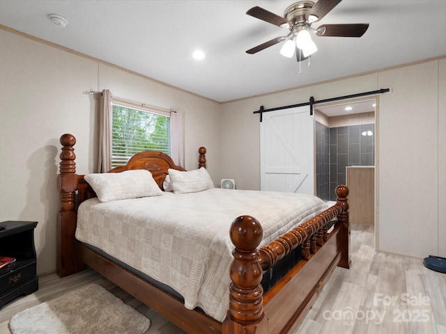 2234 Emerald Mine Rd, Shelby, NC 28152 - bedroom featuring a barn door, light wood finished floors, ornamental molding, and recessed lighting