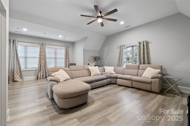 living room with recessed lighting, light wood finished floors, vaulted ceiling, and ceiling fan