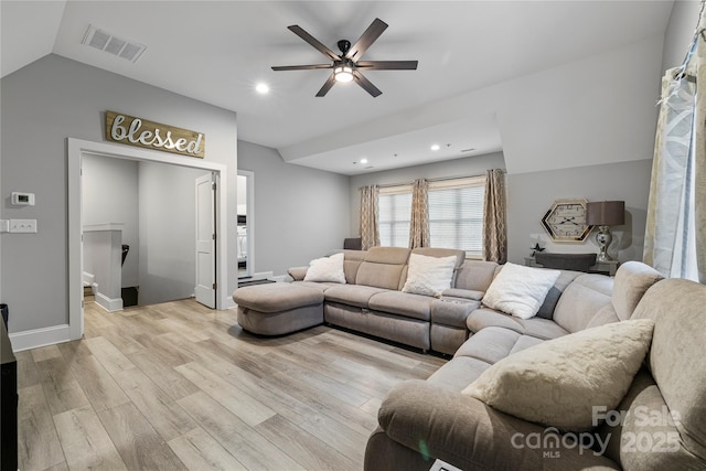 living room featuring light wood-type flooring, recessed lighting, a ceiling fan, visible vents, and lofted ceiling