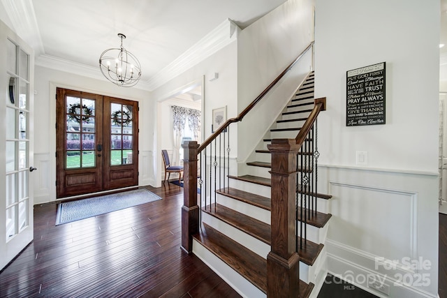 141 Forsythia Ln, Tega Cay, SC 29708 - entryway with stairs, french doors, an inviting chandelier, and crown molding