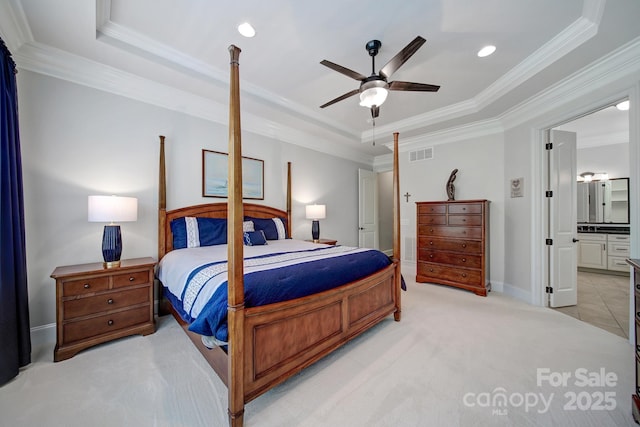 141 Forsythia Ln, Tega Cay, SC 29708 - bedroom with connected bathroom, a tray ceiling, ornamental molding, visible vents, and recessed lighting