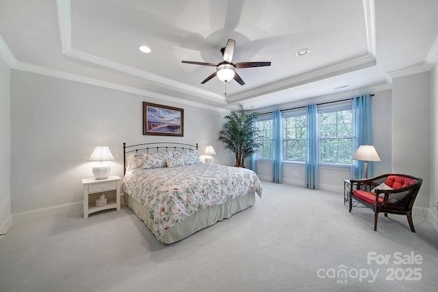 141 Forsythia Ln, Tega Cay, SC 29708 - bedroom featuring crown molding, a tray ceiling, recessed lighting, light carpet, and baseboards